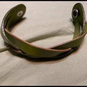 Green braided snap closure leather bracelet